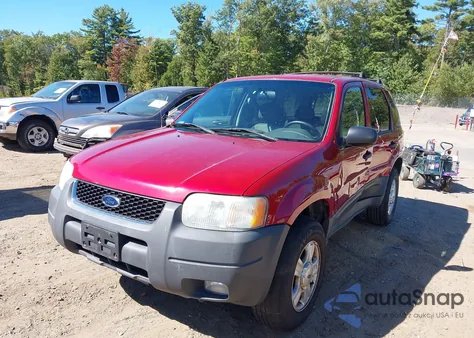 2003 Ford Escape Xlt z USA, uszkodzony, nr VIN 1FMYU93143KC64942